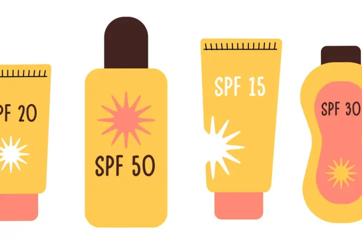 Cztery opakowania kremów z filtrem: SPF 20, SPF 50, SPF 15 i SPF 30. Dowiedz się, spf co to znaczy dla Twojej skóry.