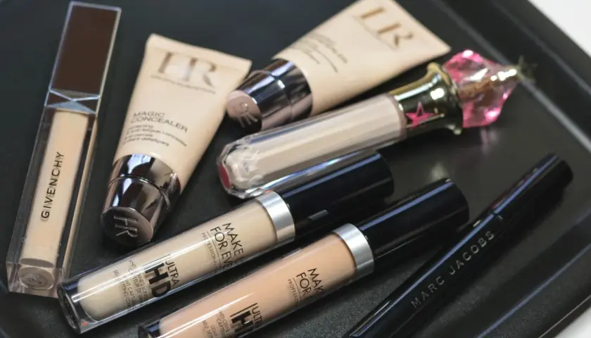 Korektor pod oczy ranking: Givenchy, Make Up For Ever Ultra HD, HR Magic Concealer i Marc Jacobs.