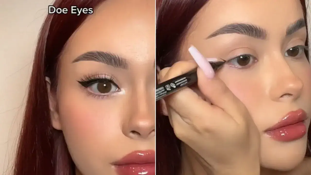 Kobieta z brązowymi oczami i błyszczącymi ustami tworzy makijaż typu "doe eyes", podkreślając spojrzenie eyelinerem.